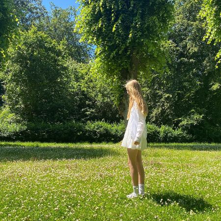 Eva Hauge posted a picture in a white summer dress on Instagram.